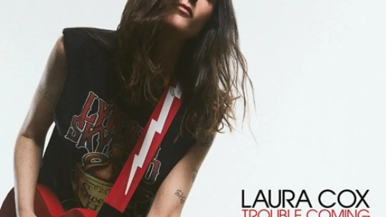 LAURA COX
