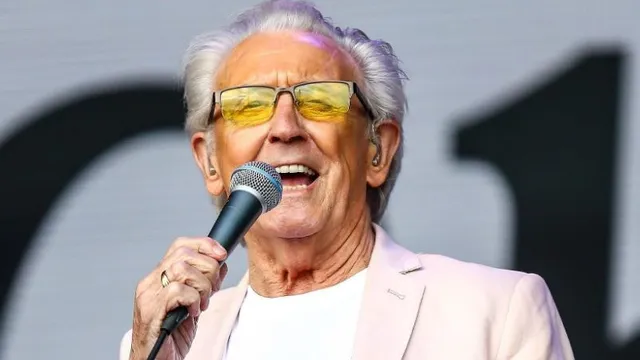 TONY CHRISTIE.
