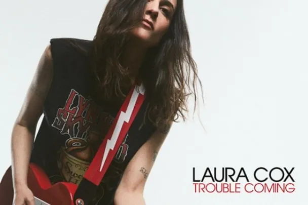 LAURA COX
